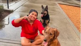 A man with two dogs