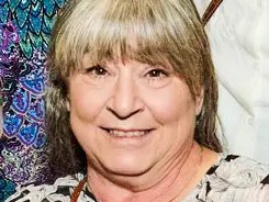 Linda Heyes, Accounting Director and Bottle Babies Program